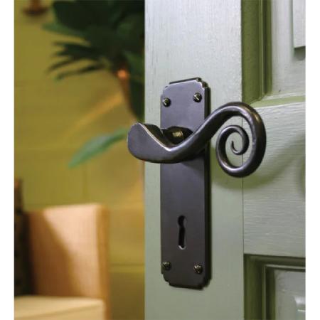 cast in style Traditional Blacksmith Monkeytail Lever Door Handle